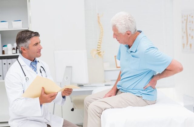 A patient with arthritis at an appointment with a doctor